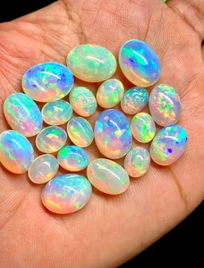 Gema de Ópalo Natural Ovalado Cabujón Pulido Opalescente para Fabricación de Joyas Lote de Gemas Sueltas Ópalo Welo Lote de Gemas de Fuego Superior - Product Image 1