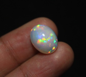 Premium Quality Natural Ethiopian Opal 14.5x11x6.5mm Oval Cut Multi Color Fire Color Play 6 Carat Loose for Jewelry Making - Product Image 1