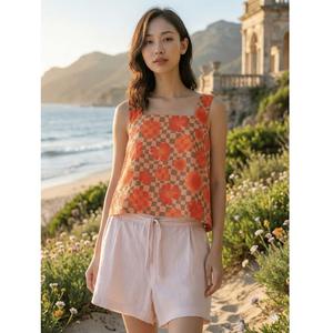 Ensemble coordonné deux pièces en coton et jute orange à motifs floraux pour femme, de qualité supérieure, confortable et doux, idéal pour la plage, disponible à la vente. - Product Image 1