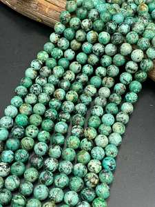 ลูกปัดหินเทอร์ควอยซ์แอฟริกันธรรมชาติทรงกลม สีเขียวฟ้าสวยงาม ประดับด้วยจุดสีดำ สำหรับทำเครื่องประดับ - Product Image 4