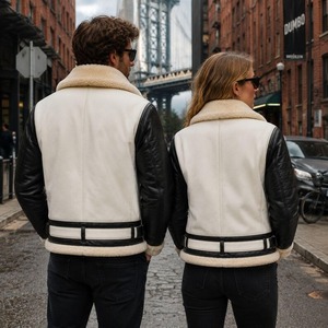 Veste en cuir unisexe bicolore blanc et noir avec doublure en fausse fourrure et col à revers à boucle - Product Image 4
