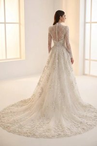 ชุดแต่งงานลูกไม้หรูหราประดับด้วยลายฉลุ แขนยาว พร้อมชายกระโปรงยาว ผู้ผลิตแบบ OEM - Product Image 5