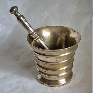 Detailed lion face relief vintage brass mortar and pestle set for home display, available at wholesale prices. - Product Image 5