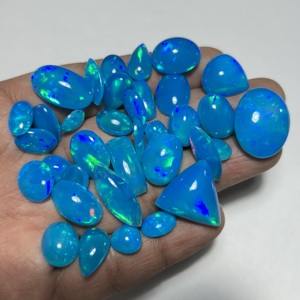 Ópalo Etíope Natural, Color Pryba Azul, con Multiflujo de Fuego Precioso, Cabujón Suelto, Gema, Piedra de Nacimiento de Octubre, Hasnain Gems - Product Image 1