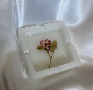 Elegant Resin Ashtray With Embedded Floral Artwork For Sophisticated Home Decor And Gift Presentation - Product Image 1