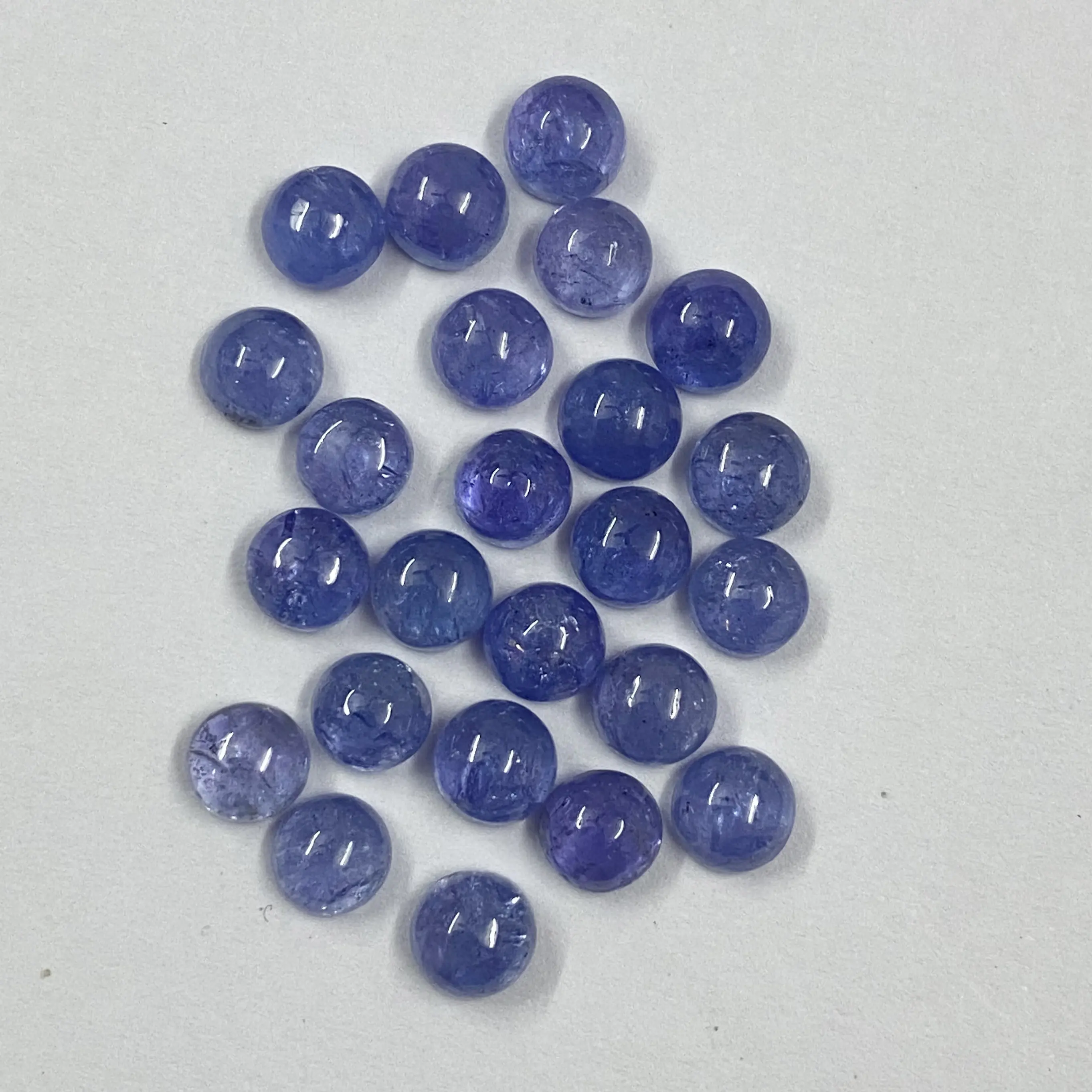 Les meilleurs cabochons ronds de couleur moyenne Tanzanite naturelle 7mm pour la fabrication de bijoux pierres précieuses en vrac de fournisseur vérifié au prix coûtant