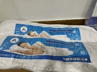 Améliorez votre expérience de sommeil avec l'oreiller de corps Aroma conçu pour la douceur et la respirabilité