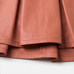 Jupe mini plissée en similicuir taille haute pour femme, couleur unie, style brillant, toutes saisons - Product Image 6