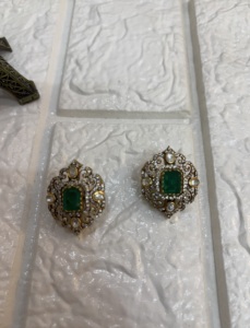 <b>studs</b> <b>earrings</b> in green doublet with gold layered in <b>silver</b> material for bridal jewelry polki stone <b>studs</b> <b>earrings</b> <b>set</b> for women - Product Image 1