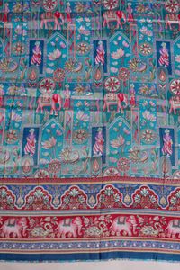 Tissu jacquard en viscose pure bleu aqua à imprimé ethnique et paysager avec bordure éléphant pour la confection de robes Kurti de créateur - Product Image 3