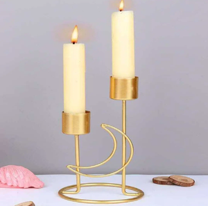 Enchanting dual gold taper <b>holder</b> showcasing a sleek, romantic crescent moon accent available at wholesale price. - Product Image 1