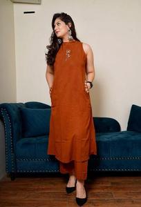 Rust Orange Sleeveless <b>Kurta</b> Set for <b>Women</b> with Embroidered Details Straight Pants Side Pockets and Elegant Ethnic Festive Style - Product Image 3