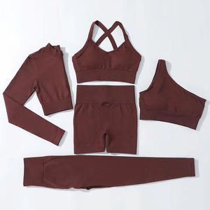 Conjunto de yoga para mujer: Sujetador deportivo con tirantes cruzados, top corto de manga larga con cremallera, leggings de cintura alta y shorts sólidos para entrenamiento. - Product Image 4