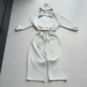 OEM ODM Pull à capuche zippé ample et long en coton 100% uni respirant pour hommes et femmes, personnalisé et brodé - Product Image 3