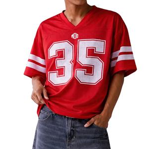 เสื้อเจอร์ซีย์อเมริกันฟุตบอลพรีเมียมขายส่งแบบยูนิเซ็กส์ สตรีทแวร์ทรงโอเวอร์ไซส์ แขนสั้น ผ้าโพลีเอสเตอร์ เสื้อกีฬา รับผลิตตามแบบ OEM จากผู้ผลิต - Product Image 1