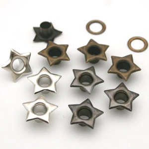 Ojetes metálicos de cobre y latón de 5 mm con arandela en forma de estrella, diseño OEM 2026, personalizados para prendas de vestir - Product Image 1