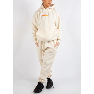 Conjunto de suéter de punto jacquard informal de invierno 2026, nuevo, antiarrugas, de secado rápido, a la moda para mujer, de manga corta con capucha y pantalón de pierna ancha. - Product Image 1