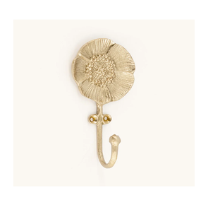 Versátil gancho de pared de latón diseñado para la organización decorativa del hogar, adecuado para espacios de estar y áreas de trabajo. - Product Image 1