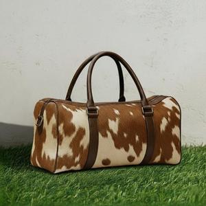 กระเป๋าเดินทางหนังวัวแท้ลายขนสัตว์ ดีไซน์เนอร์ รุ่น LHTB-0110 สำหรับเดินทางท่องเที่ยว  แบบถือขึ้นเครื่อง  รับผลิตตามแบบ OEM ส่งออกจำนวนมาก - Product Image 1