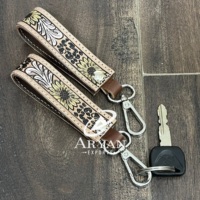 Nouveau porte-clés artisanal en cuir de vache véritable, gravé motif floral tournesol, avec fermoir mousqueton durable, idéal comme cadeau