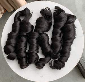 Extensiones de cabello humano vietnamita virgen Remy de trama única ondulada hinchable precio de fábrica - Product Image 1