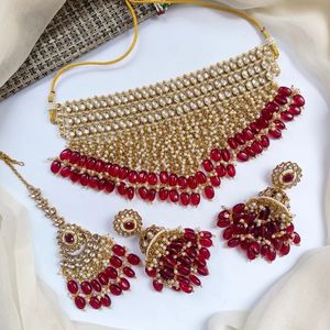 Parure de bijoux indiens en acier inoxydable plaqué or antique avec collier ras-du-cou et boucles d'oreilles Jhumka ornées de pierres de zircon pour femme, idéale pour les mariages et la mode. - Product Image 2
