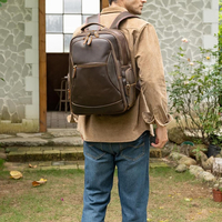 Mochila con impresión de logotipo personalizado para uso en exteriores, último diseño, color sólido, mochila de cuero para hombre en grandes cantidades.