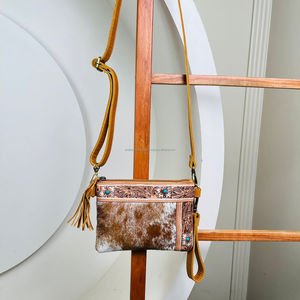 กระเป๋าถือหนังแท้ลายสลักมือสำหรับผู้หญิง ดีไซน์หรูหรา หนังวัวแท้ สะพายไหล่หรือถือแบบมินิ ปี 2025 - Product Image 5