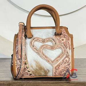 กระเป๋าหนังแท้แบบใหม่ผมแบบตะวันตกกระเป๋าถือคาดลำตัวมีที่จับด้านบนเป็นรูปหัวใจประดับด้วยหนังวัว - Product Image 1