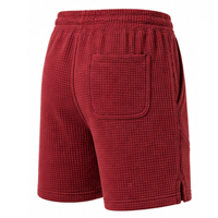 Shorts de sport texturés en maille gaufrée pour hommes, décontractés, avec poches latérales, taille élastique, fabricant de vêtements OEM ODM pour hommes