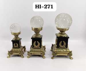 A stunning set of 3 vintage-style aluminum decorative stands featuring faceted <b>crystal</b> <b>spheres</b> on sturdy, ornate pedestals - Product Image 1