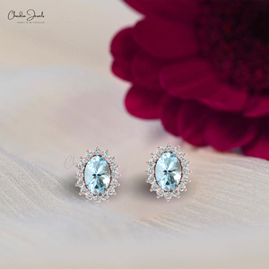 ต่างหูเพชรทรงวงรีขนาด 6x4 มม. ประดับพลอยอะความารีน ตัวเรือนทองคำแท้ 14K พร้อมเพชรรอบวง  ของใหม่มาแรง  ของขวัญประจำเดือนมีนาคม  ราคาขายส่ง - Product Image 1