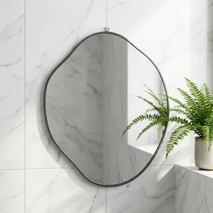 Miroir mural minimaliste de forme irrégulière avec cadre en métal, surface en verre décorative pour salon ou salle de bain - Product Image 4
