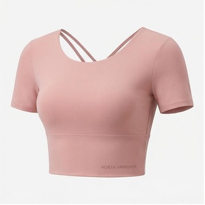 Top Corto Deportivo de Yoga sin Costuras con Tirantes Cruzados Rosa North Approach, Manga Corta, Transpirable, Color Sólido, Cintura Alta - Product Image 1