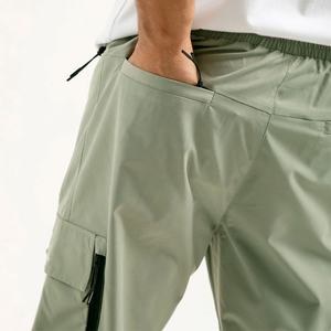 Pantalon cargo fuselé réglable pour hommes avec caractéristiques personnalisées Tissu extensible durable Marque personnalisée Multi-poches - Product Image 4