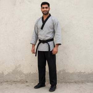 Uniforme de Karate Personalizado con Solapa Negra y Pantalones 100% Algodón Transpirable, Dobok de Artes Marciales, Uniforme de Taekwondo, Fabricante OEM - Product Image 1