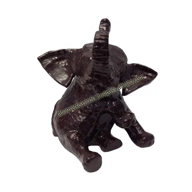 Statue d'éléphant brun créatif de vente directe avec le tronc augmenté pour la pièce maîtresse de Table de salon