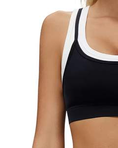 ชุดออกกำลังกายสำหรับผู้หญิง เสื้อชั้นในกีฬาไร้ตะเข็บและกางเกงขาสั้นเอวสูง สีดำขาว เนื้อผ้านุ่ม ยืดหยุ่น ระบายอากาศได้ดี เหมาะสำหรับออกกำลังกายและฟิตเนส - Product Image 3