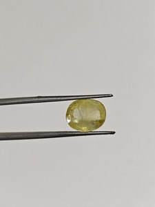 พลอยแซฟไฟร์สีเหลืองพรีเมียม 6.70 กะรัต รูปทรงวงรี สำหรับแหวนหมั้นและเครื่องประดับชั้นดี - Product Image 4