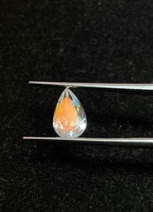 Piedra lunar arcoíris fuego naranja, corte pera, gema natural transparente con corte pera. - Product Image 1