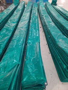 ผ้าใบกันน้ำสีเขียว กว้าง 67 นิ้ว น้ำหนักปานกลาง ทอสำหรับใช้งานกลางแจ้ง สีพื้นเรียบ ทนทาน - Product Image 1