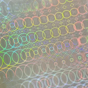 Película Holográfica Transparente Circular de Alta Calidad, Rollo de Vinilo Autoadhesivo con Efecto Arcoíris para Impresión de Etiquetas de Marca y Proyectos - Product Image 1