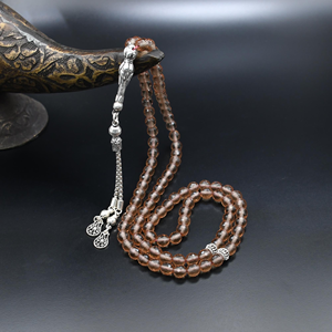 Cuentas de tasbih de piedra redonda color melocotón claro con imame naranja y borlas de hojas, disponibles a precios de mayoreo. - Product Image 6