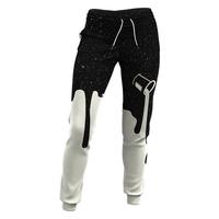 Pantalon de survêtement personnalisé pour homme avec imprimé effet gouttelettes, taille élastique, cordon de serrage, design décontracté à empiècements, noir et blanc, en polyester, pour l'automne
