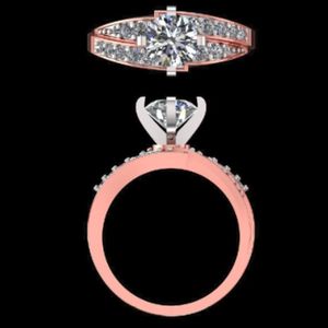 Élégante bague de fiançailles en diamant taille brillant rond, en or rose et blanc 18 carats bicolore, avec large bande pavée. - Product Image 3