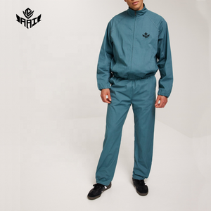 Conjunto Deportivo Personalizado con Chaqueta y Pantalones Cortavientos con Cierre, Ropa Deportiva Ligera de Dos Piezas para Correr, Venta al Por Mayor - Product Image 1