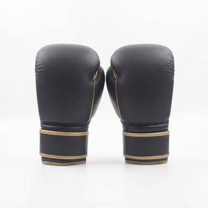 Gants de boxe professionnels en cuir noir avec garniture dorée et sangle de poignet Velcro pour entraînement adulte - Product Image 2