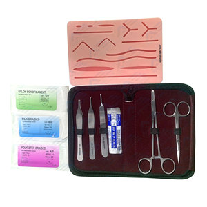 Kit complet d'instruments médicaux pour la pratique des sutures chirurgicales, avec coussin de suture cutanée - Product Image 1