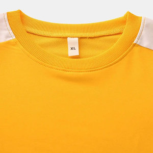 เสื้อสเวตเชิ้ตคอกลมผู้ชาย ปี 2026 แบบถักสีตัดต่อ ทรงปกติ สวมใส่สบาย แขนเสื้อแบบแร็กแลน สีเหลือง ขาว ดำ สำหรับขาย - Product Image 3