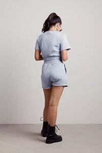 Ensemble deux pièces uni col rond manches courtes ourlet élastique Top court et taille élastique poche latérale Short ensembles de survêtement femmes - Product Image 5